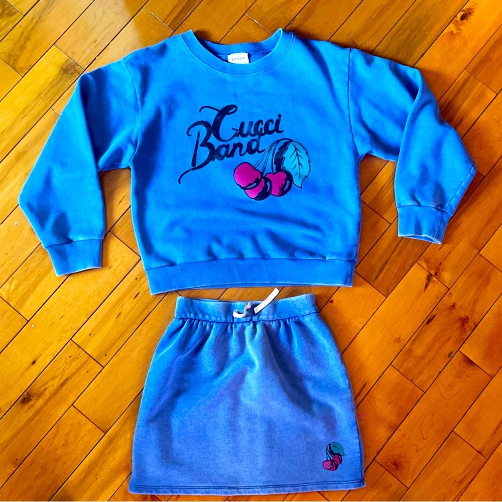 Gucci blue crewneck sweater with skirt
